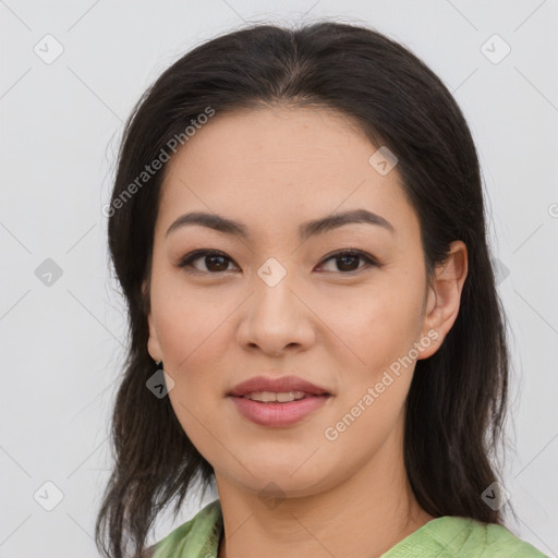 Joyful asian young-adult female with medium  brown hair and brown eyes