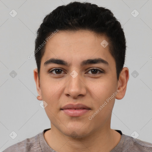 Joyful latino young-adult male with short  black hair and brown eyes