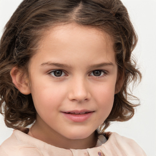 Joyful white child female with medium  brown hair and brown eyes