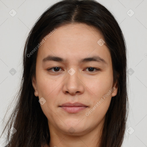 Joyful white young-adult female with long  brown hair and brown eyes