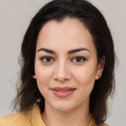 Joyful white young-adult female with medium  brown hair and brown eyes