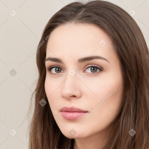 Neutral white young-adult female with long  brown hair and brown eyes