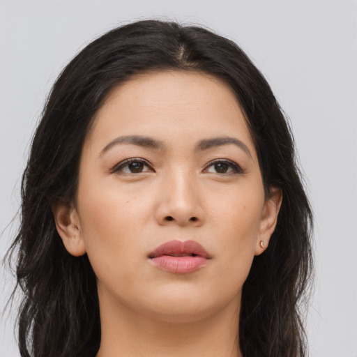 Neutral asian young-adult female with long  brown hair and brown eyes
