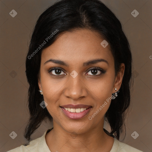 Joyful black young-adult female with medium  brown hair and brown eyes