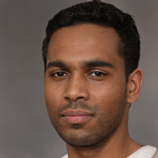 Neutral black young-adult male with short  black hair and brown eyes