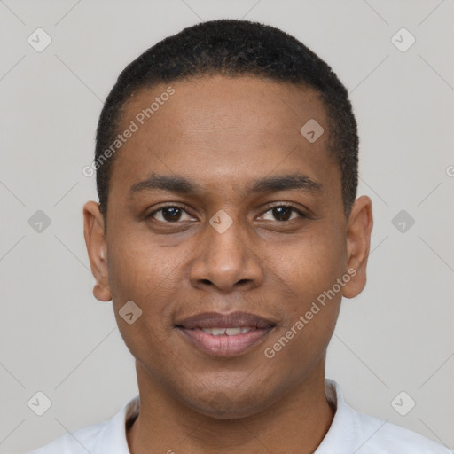 Joyful black young-adult male with short  brown hair and brown eyes