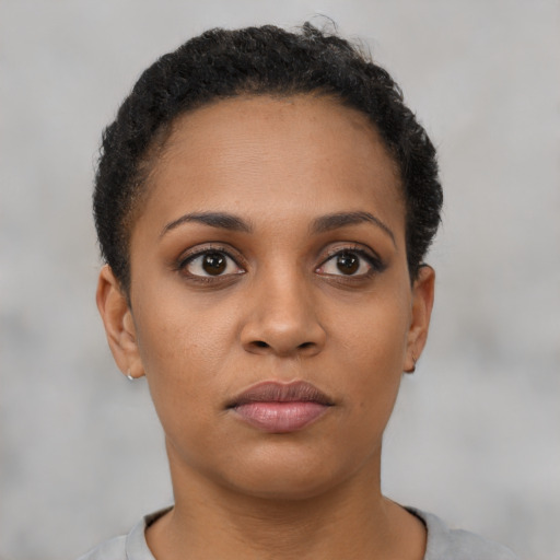 Neutral black young-adult female with short  brown hair and brown eyes