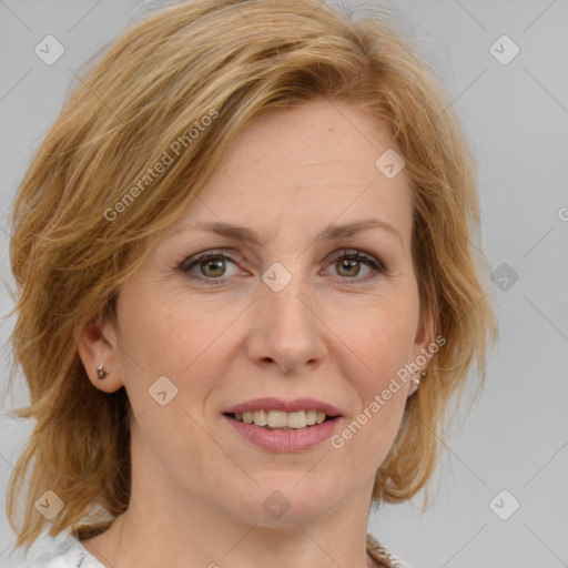 Joyful white adult female with medium  brown hair and blue eyes