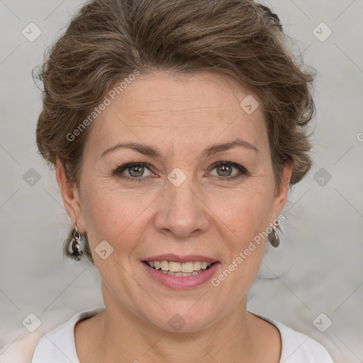 Joyful white adult female with short  brown hair and brown eyes