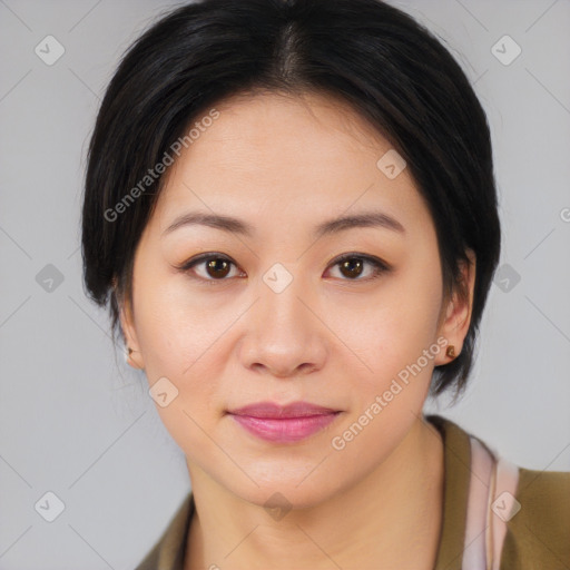 Joyful asian young-adult female with medium  brown hair and brown eyes