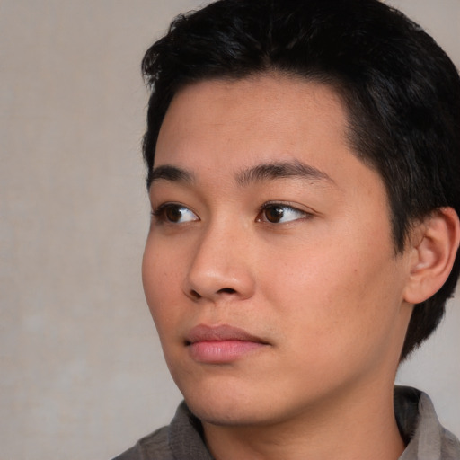 Neutral asian young-adult male with short  black hair and brown eyes
