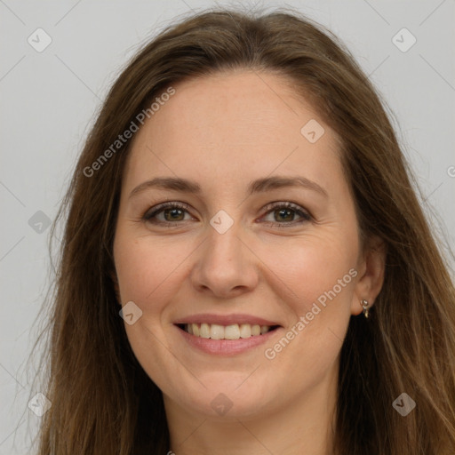 Joyful white young-adult female with long  brown hair and grey eyes