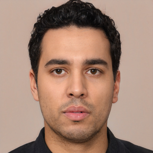Neutral white young-adult male with short  black hair and brown eyes