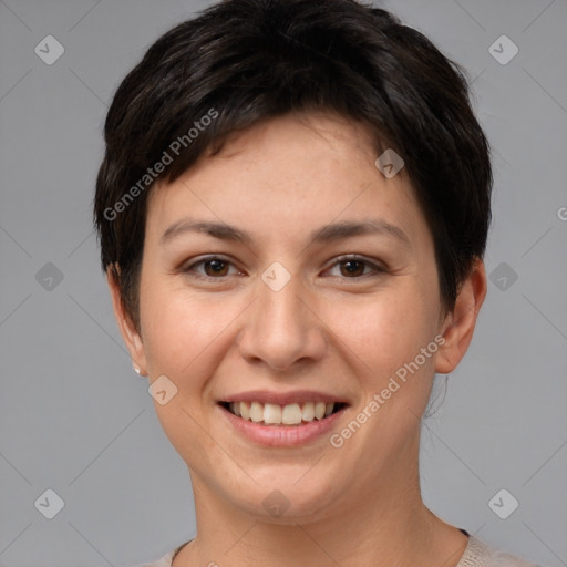 Joyful white young-adult female with short  brown hair and brown eyes