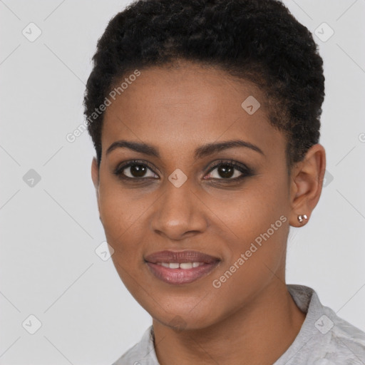 Joyful black young-adult female with short  brown hair and brown eyes