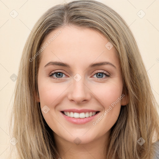 Joyful white young-adult female with long  brown hair and green eyes