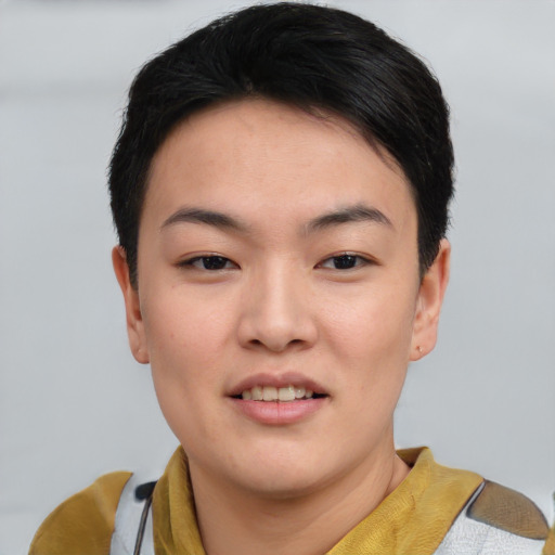 Joyful asian young-adult female with short  brown hair and brown eyes
