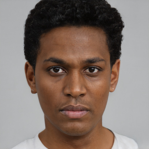 Neutral black young-adult male with short  black hair and brown eyes