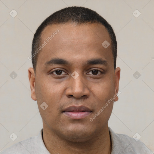 Neutral latino young-adult male with short  black hair and brown eyes