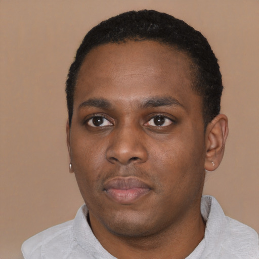 Neutral black young-adult male with short  black hair and brown eyes