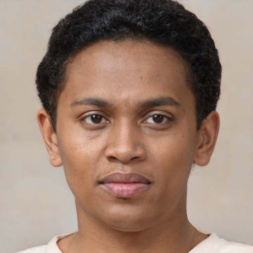 Neutral latino young-adult male with short  brown hair and brown eyes