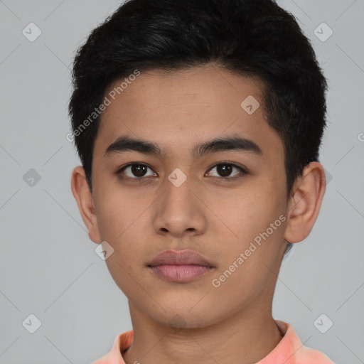 Neutral latino young-adult male with short  brown hair and brown eyes
