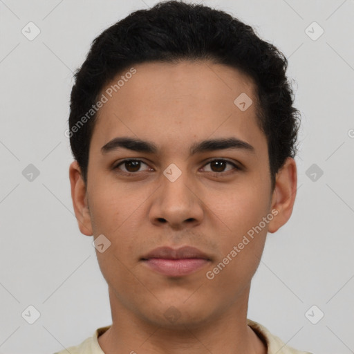 Neutral latino young-adult male with short  brown hair and brown eyes