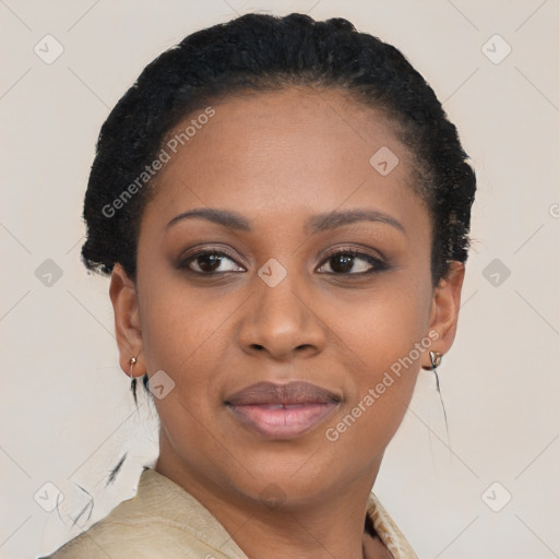 Joyful black young-adult female with short  brown hair and brown eyes