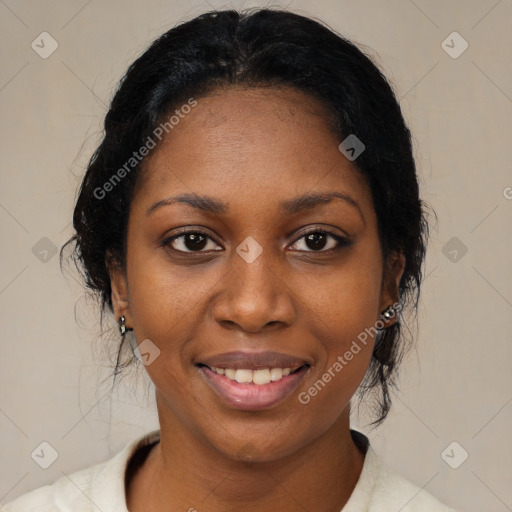 Joyful black young-adult female with medium  black hair and brown eyes