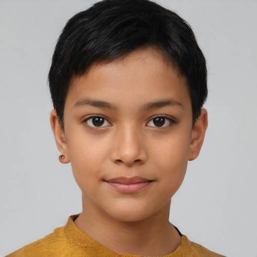 Joyful latino child female with short  brown hair and brown eyes