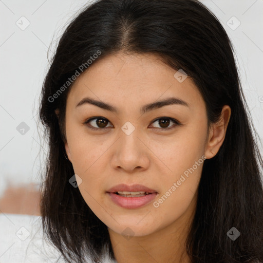 Joyful asian young-adult female with long  brown hair and brown eyes