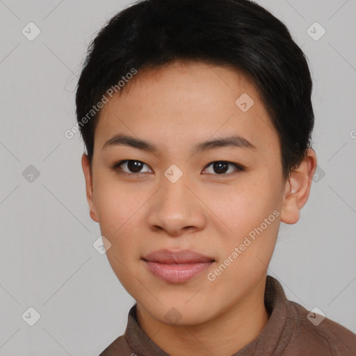 Joyful asian young-adult female with short  black hair and brown eyes