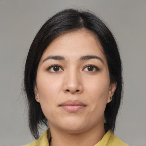 Neutral asian young-adult female with medium  black hair and brown eyes