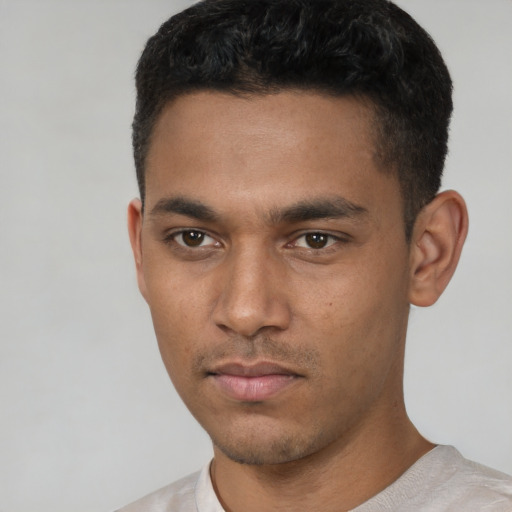 Neutral white young-adult male with short  black hair and brown eyes
