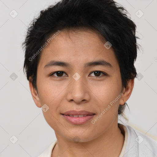 Joyful asian young-adult female with short  brown hair and brown eyes