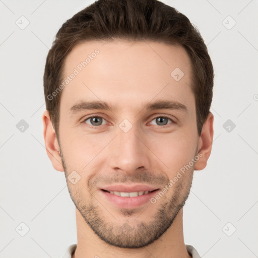 Joyful white young-adult male with short  brown hair and brown eyes