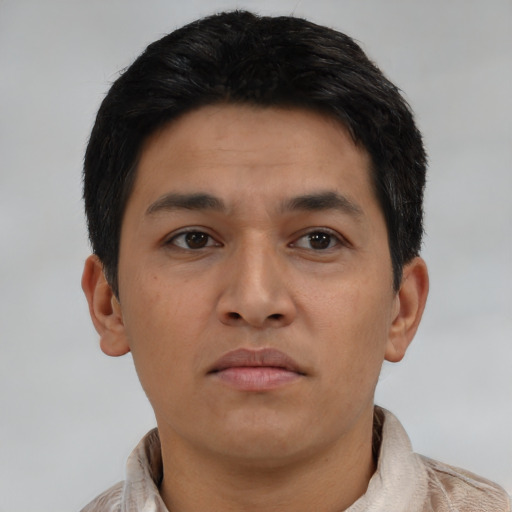Neutral latino young-adult male with short  brown hair and brown eyes