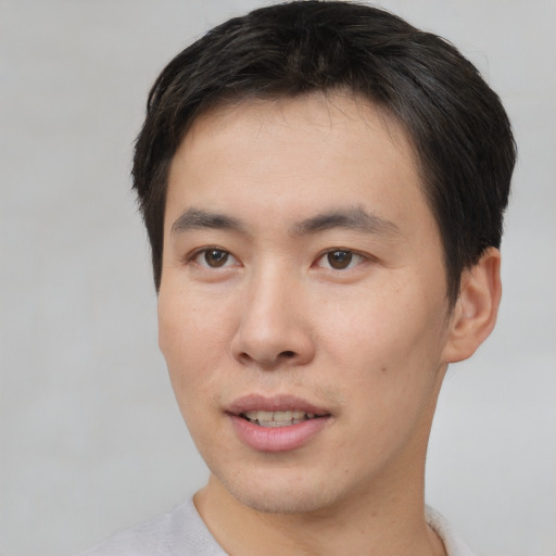 Neutral asian young-adult male with short  brown hair and brown eyes