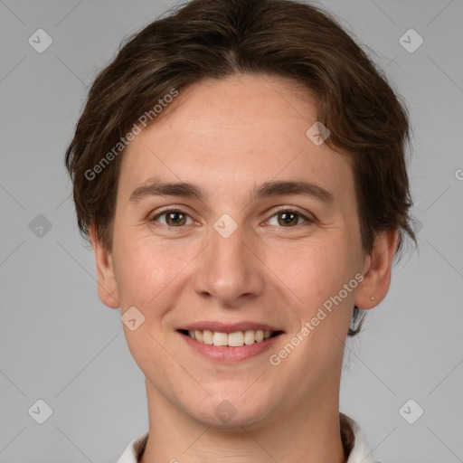 Joyful white young-adult female with short  brown hair and grey eyes