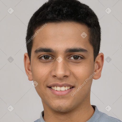 Joyful latino young-adult male with short  brown hair and brown eyes