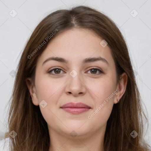 Joyful white young-adult female with long  brown hair and grey eyes