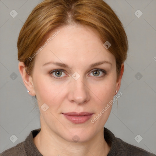 Joyful white adult female with medium  brown hair and blue eyes