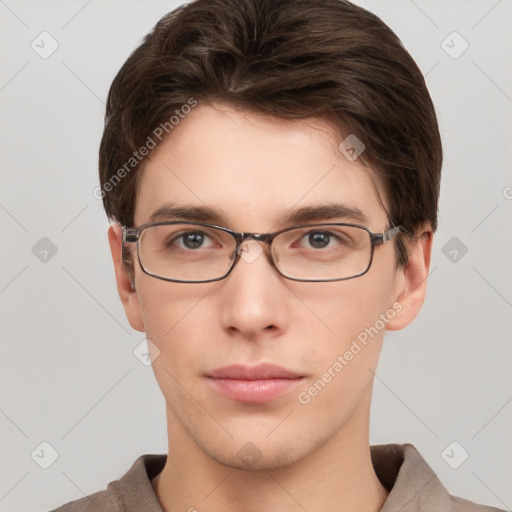 Neutral white young-adult male with short  brown hair and grey eyes