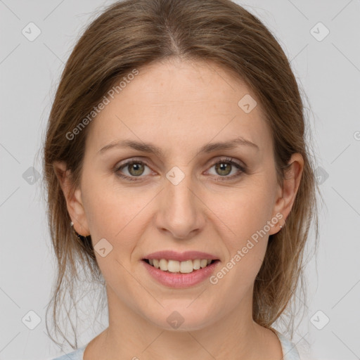 Joyful white young-adult female with medium  brown hair and grey eyes