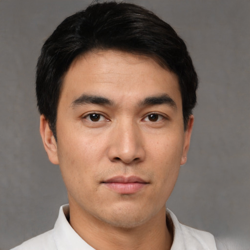 Neutral asian young-adult male with short  black hair and brown eyes