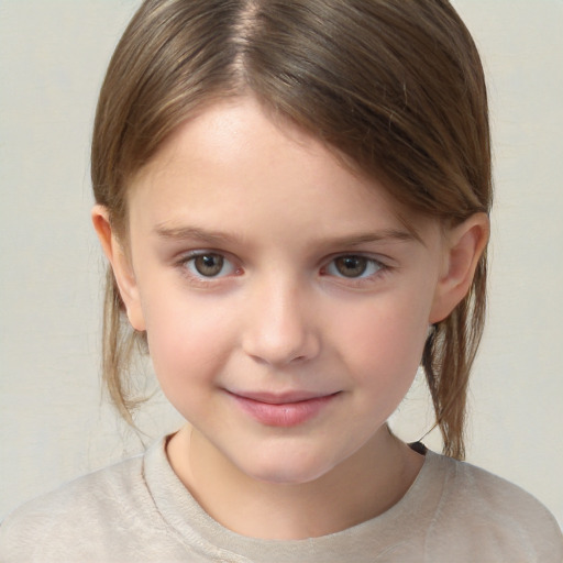 Joyful white child female with medium  brown hair and brown eyes