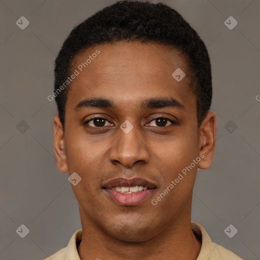 Joyful black young-adult male with short  brown hair and brown eyes