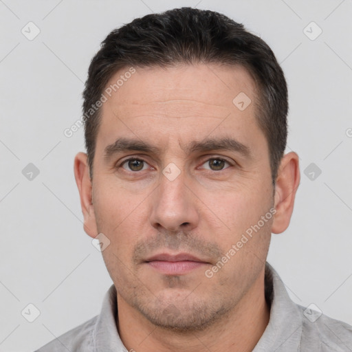 Neutral white adult male with short  brown hair and brown eyes