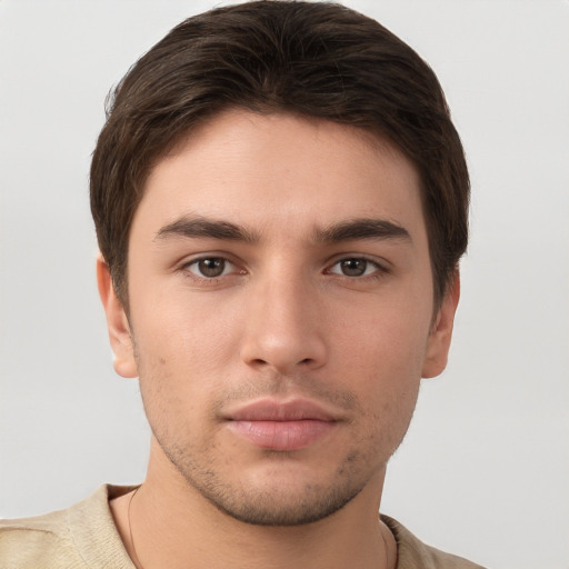 Neutral white young-adult male with short  brown hair and brown eyes