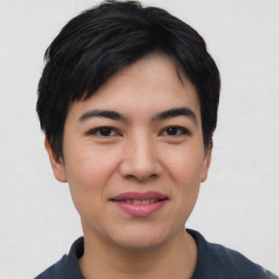 Joyful asian young-adult female with short  black hair and brown eyes